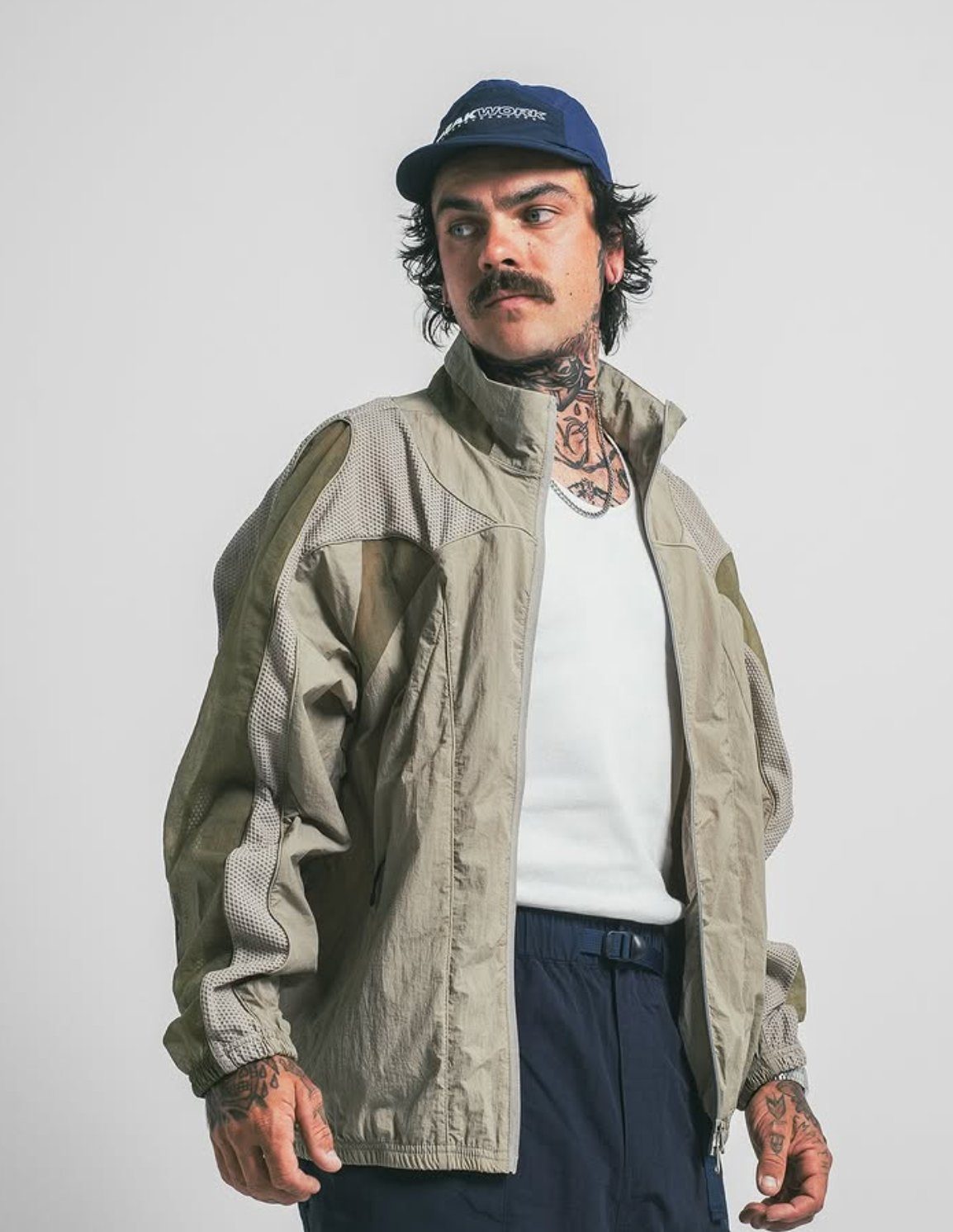 Peakwork — Panelled shell, worn in